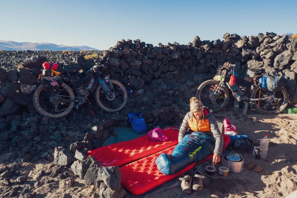 Hana Black and Mark Watson ride their Otso Cycles Voytek bikes on a long distance bikepacking trip in South America.