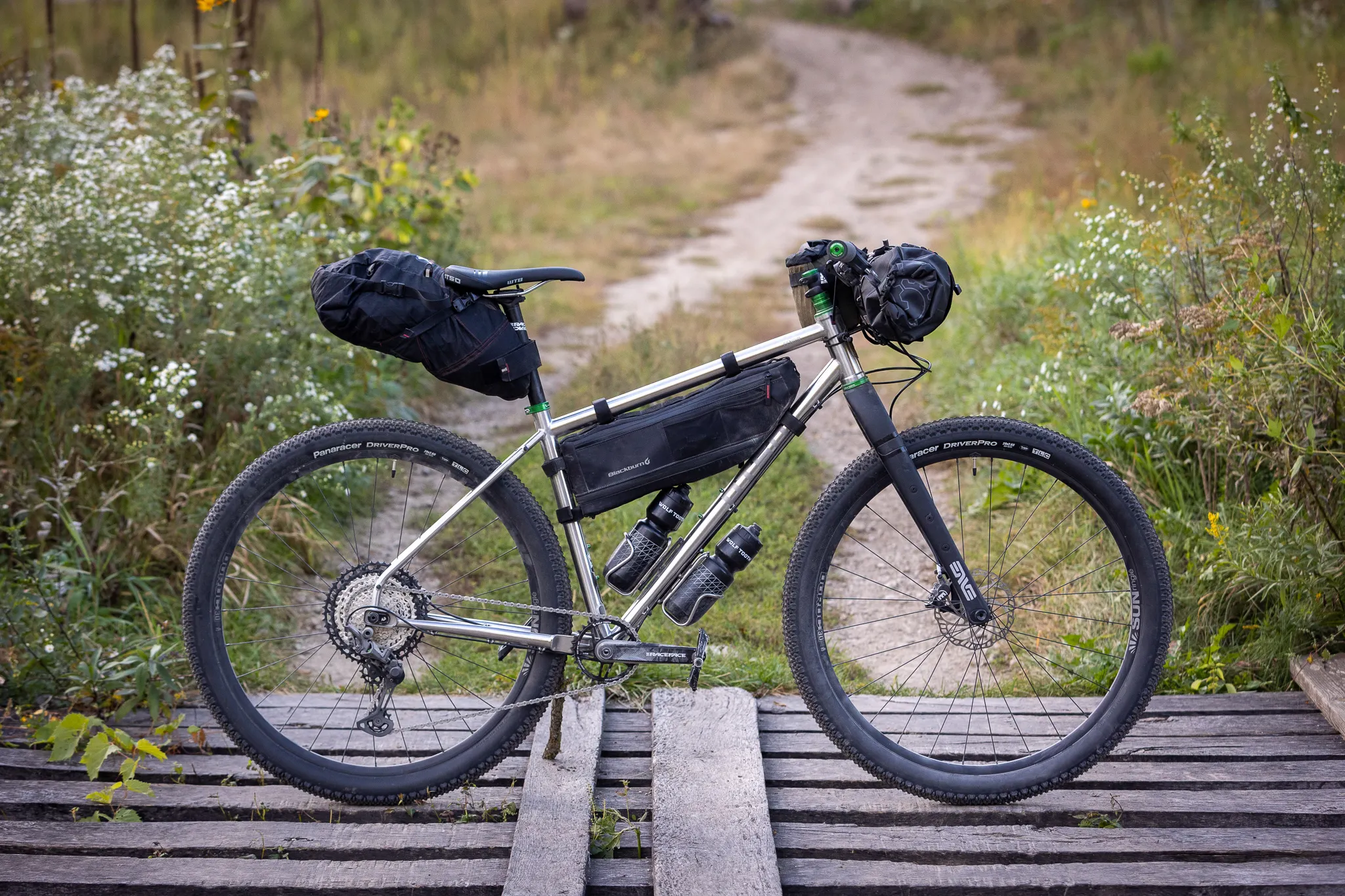 Otso Cycles Fenrir Stainless is a ride-anywhere bike for bikepacking races and afternoon adventures that can be built with drop bars or MTB bars.